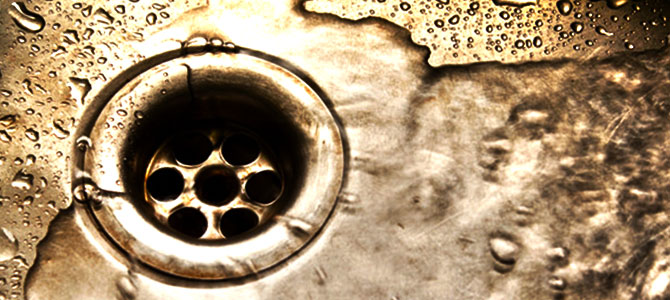 water going down sink drain